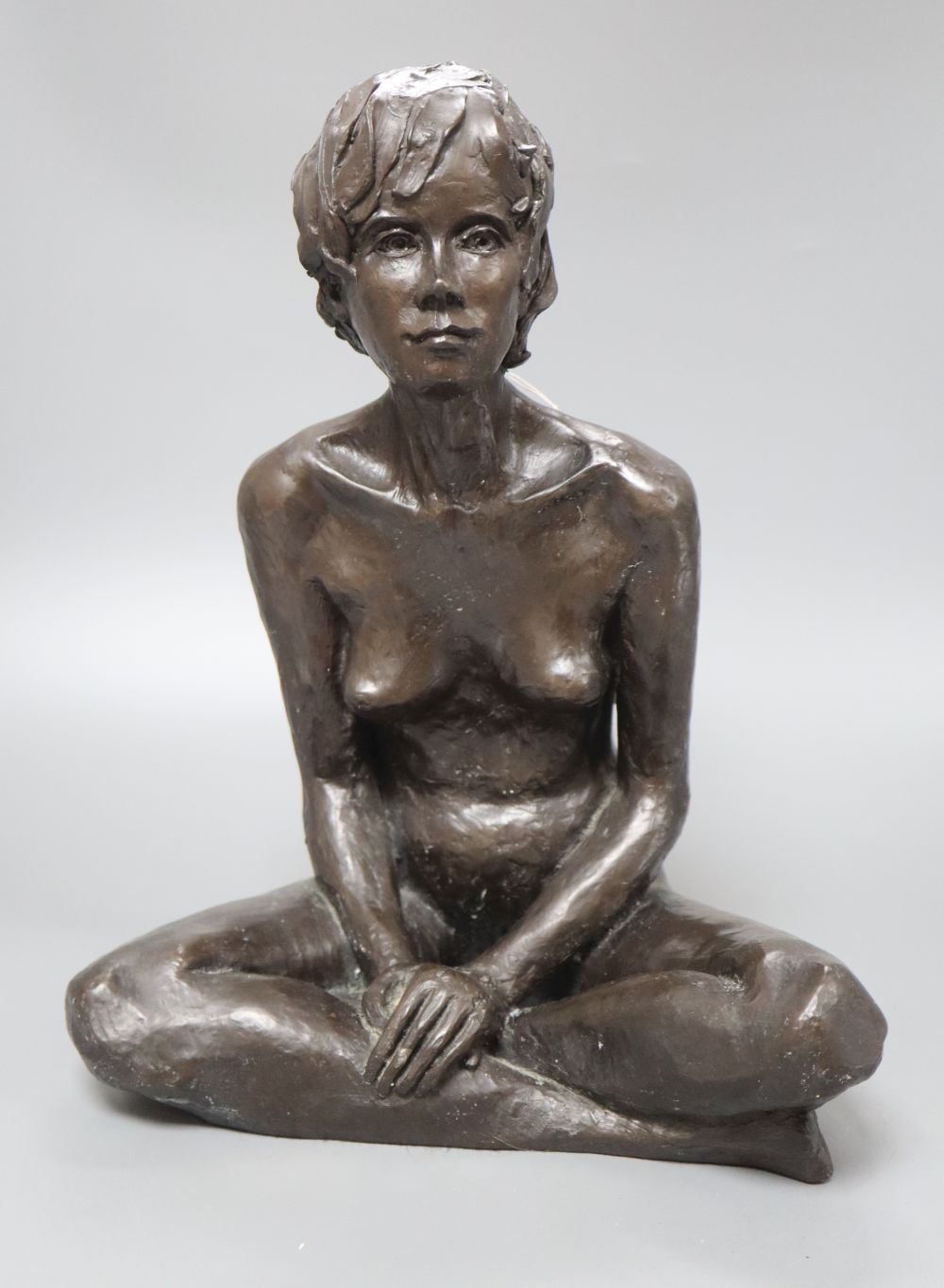 A modern bronzed resin model of a nude Mona, 32cm high